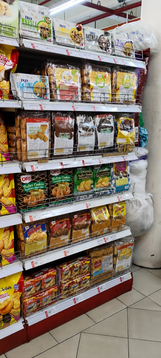 The same shelf after stocking, facing and tidying